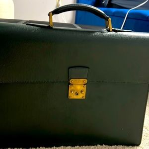 Dark green Louis Vuitton briefcase with replacement handle on right side